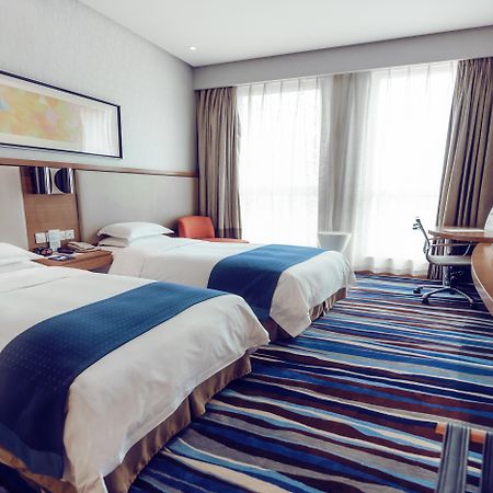 Holiday Inn Express Chongqing Guanyinqiao By Ihg Экстерьер фото